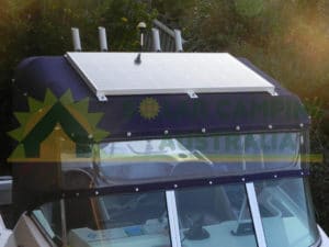 Photos of a 125W Solar Panel mounted on the boat along with a dual batttery solar controller charger.