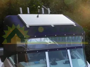 Photos of a 125W Solar Panel mounted on the boat along with a dual batttery solar controller charger.